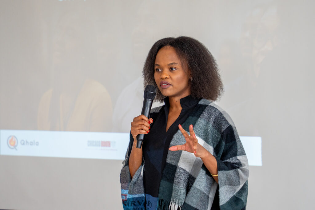 Speaker Carolyne Mweberi discussing the AI ecosystem in Kenya during the PEDL Workshop on AI, Finance and Entrepreneurship.